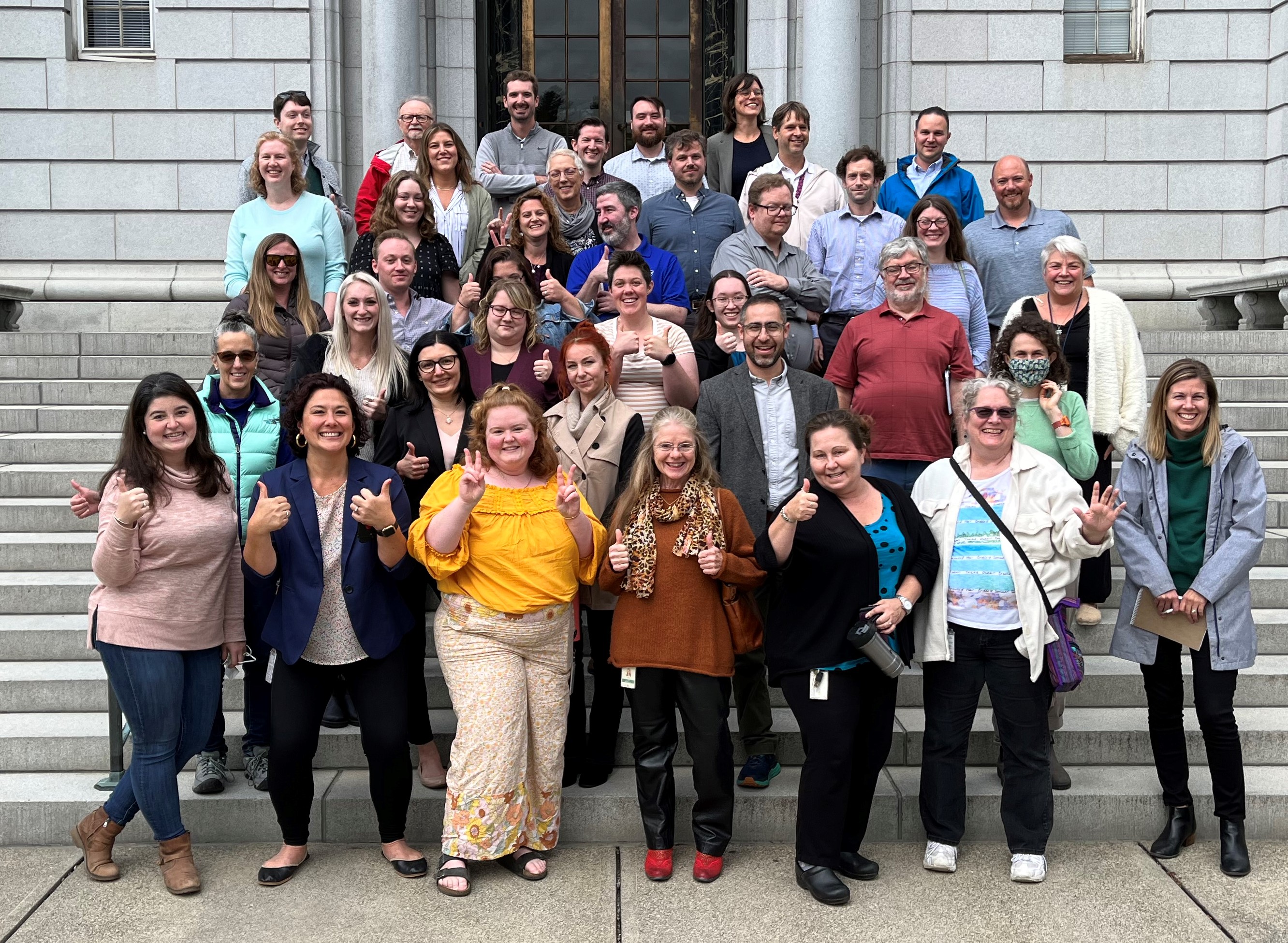 Staff photo on stairs